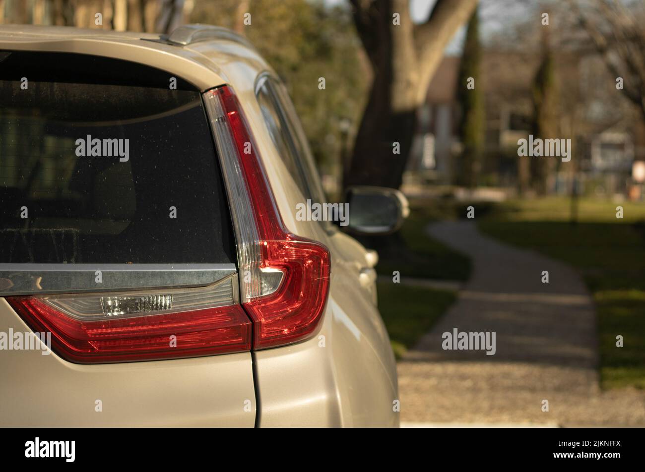 A suv sports utility vehicle in a small neighborhood Stock Photo