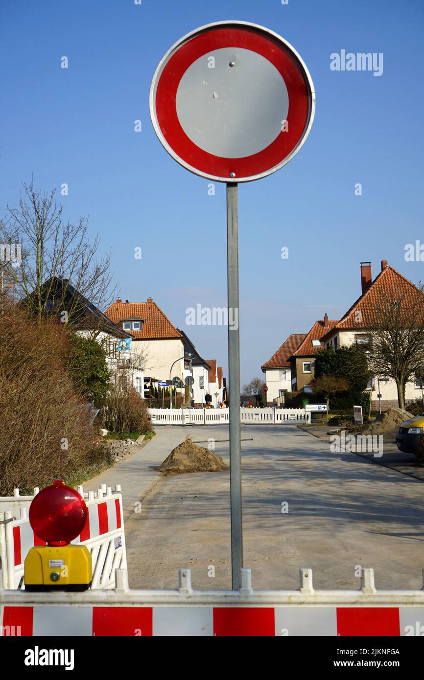 A road sign pole forbidding the prohibition on the street Stock Photo