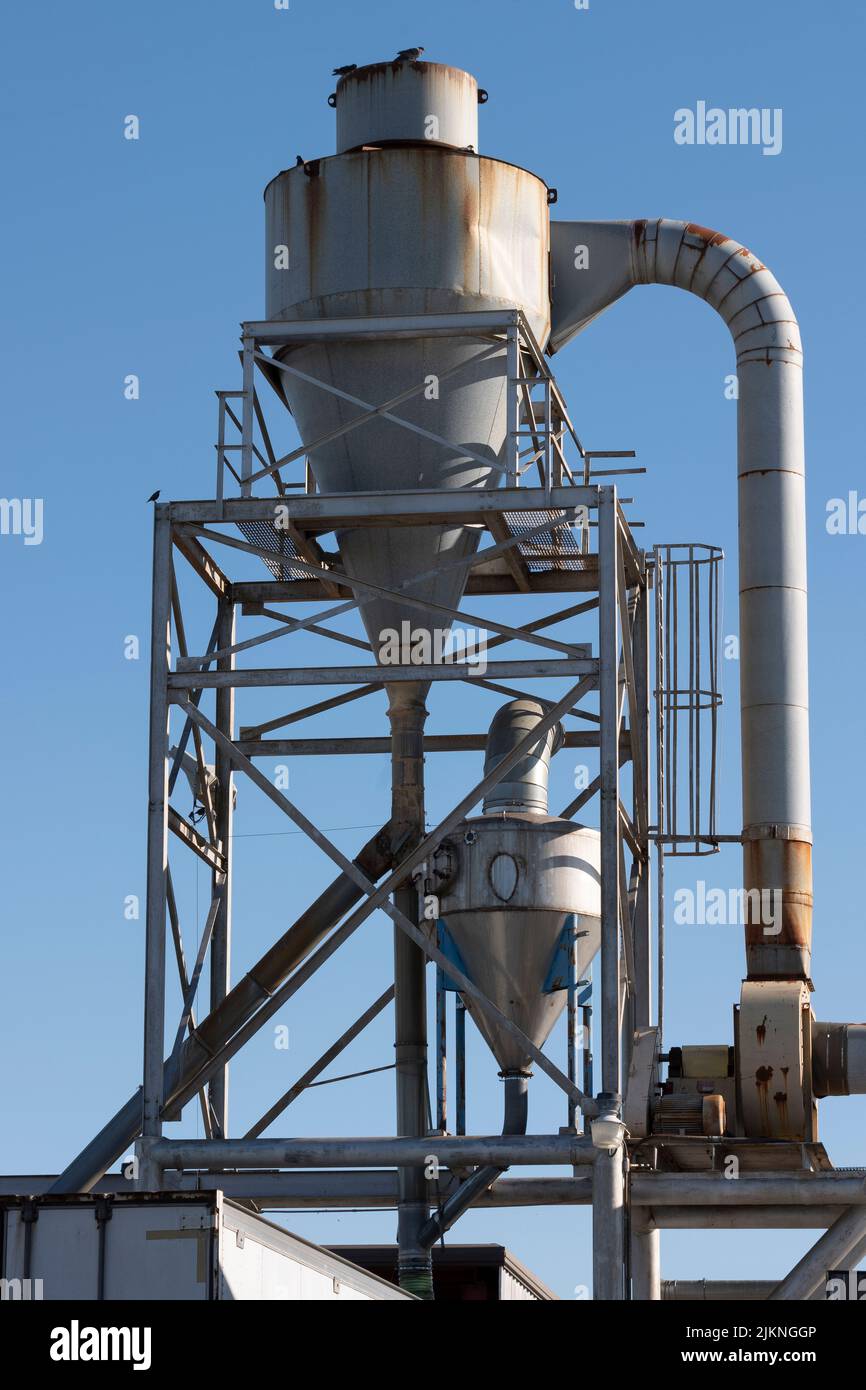 An industrial sawdust collector in operation at a factory in New Bern