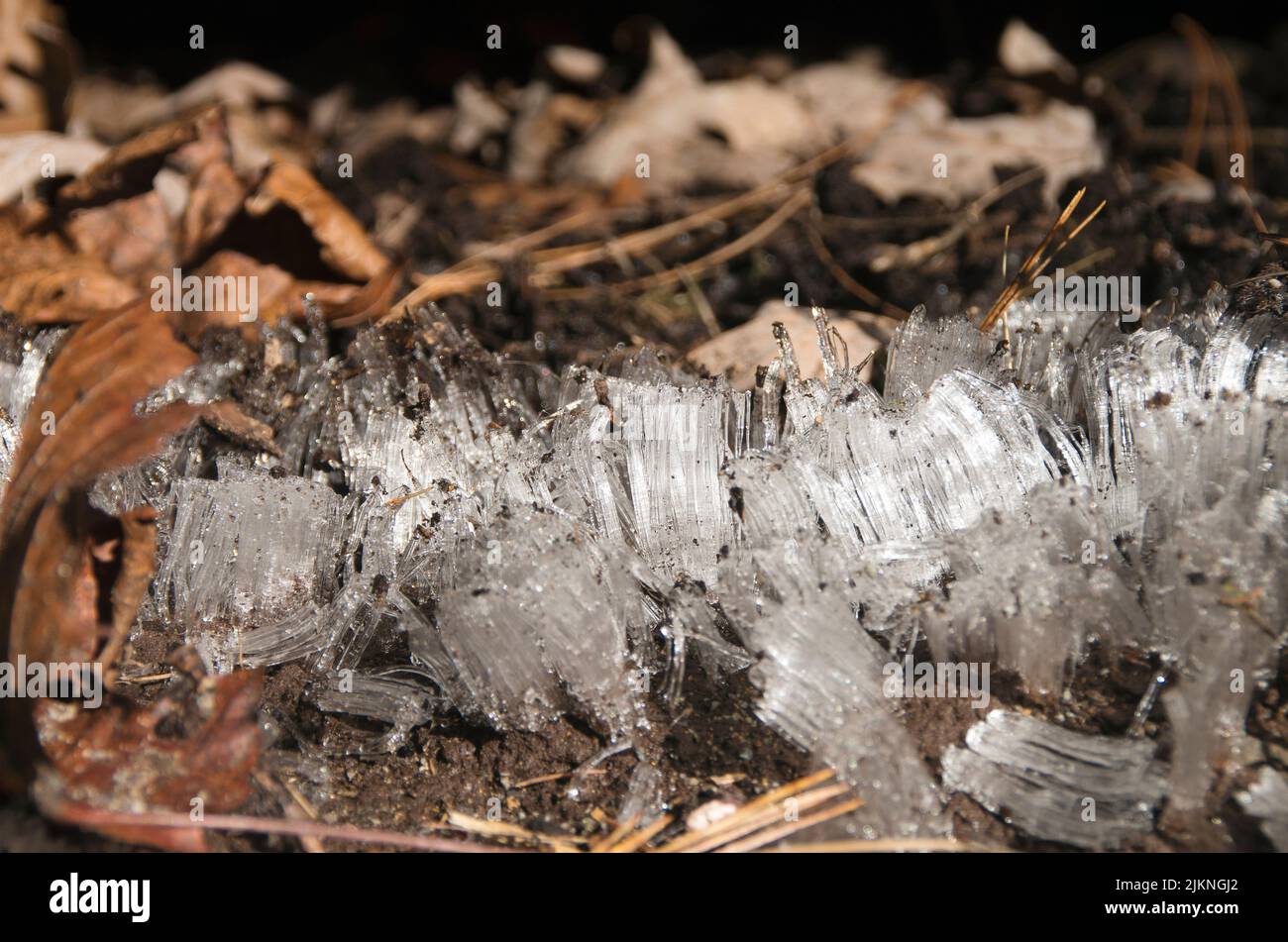Ice crystals which have formed under the eaves of a house in Deep Creek Lake Maryland Stock Photo
