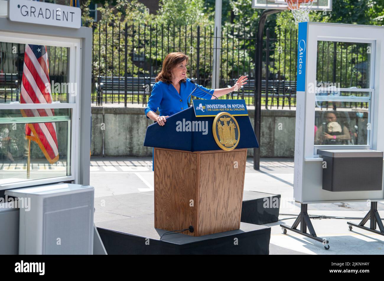 Governor Kathy Hochul speaks during a joint housing and clean energy-related announcement at Woodside Houses NYCHA complex in Queens Borough of New York City. Governor Hochul and Mayor Adams announce $70 million initial investment to decarbonize NYCHA buildings as part of clean heat for all challenge. The plan calls for the installation of what's called an 'electric heat pump', developed by NYPA selected Midea America and Gradient, in 30,000 units, which would provide tenants in each apartment with the ability to control the heat or keep their units cool throughout the year. Stock Photo