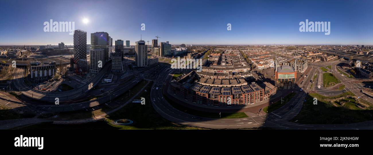 Wide aerial 360 degrees panorama of Utrecht central train station and financial district area with central train station and multicultural residential Stock Photo