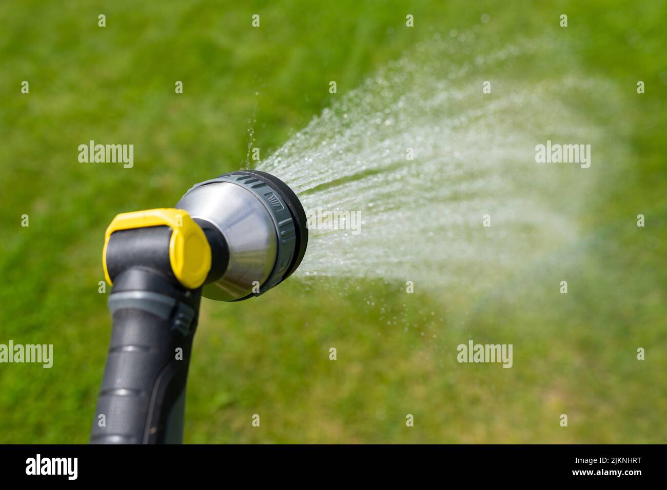 Adult garden hose sun hires stock photography and images Alamy