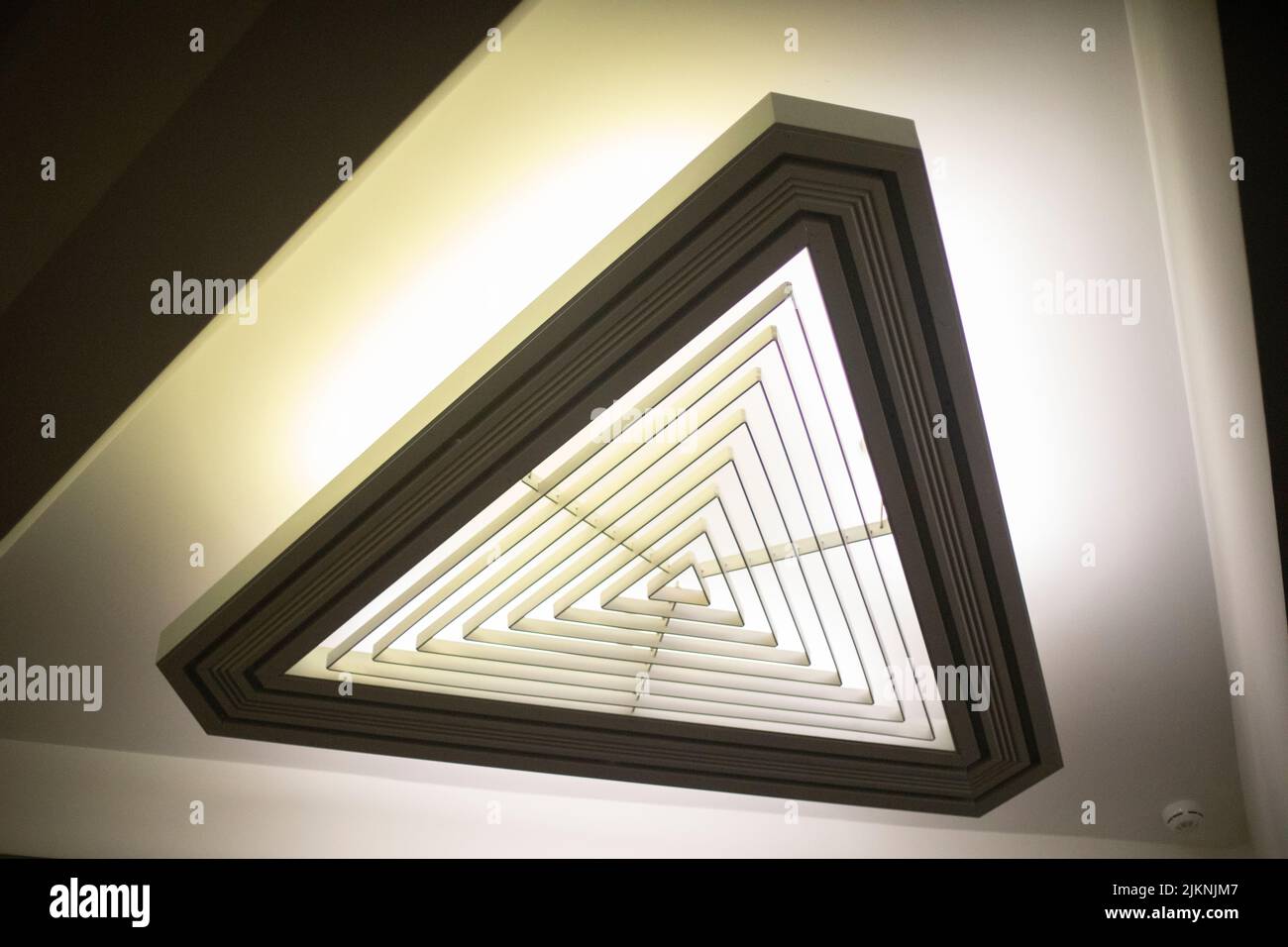 Lamps in interior. Light in room. Ceiling in apartment. Light design. Stock Photo