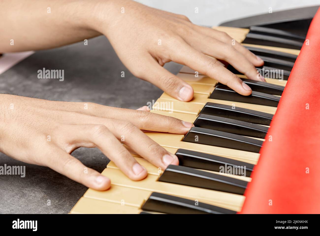 Human hand playing electric piano hi-res stock photography and images ...