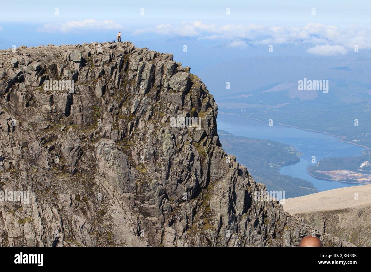 Man standing on mountain top hi-res stock photography and images - Alamy
