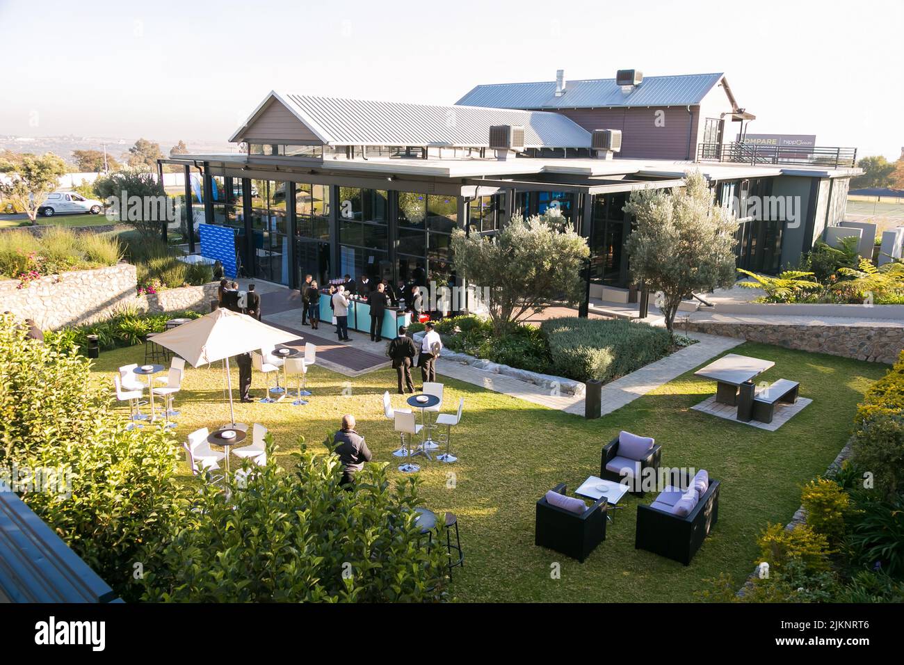 An outdoor view at an event venue with garden furnitures in