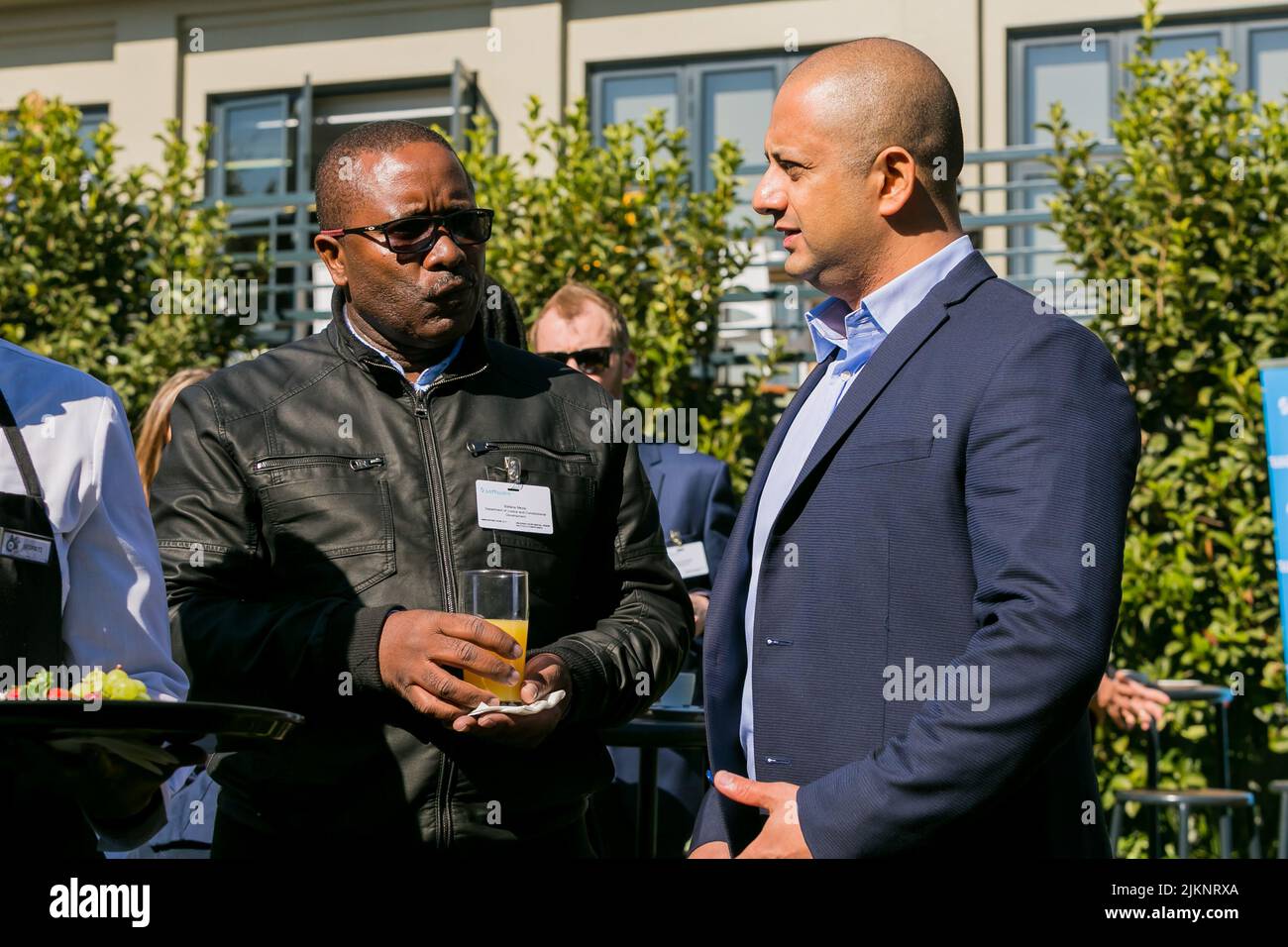 A group of delegates networking at a business conference in Johannesburg, South Africa Stock