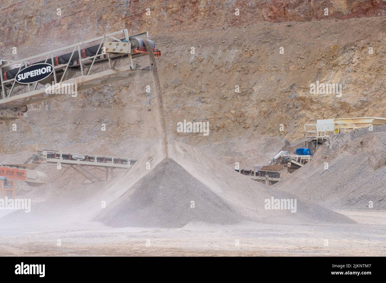 Conveyor dumping gravel at an industrial gravel pit Stock Photo - Alamy