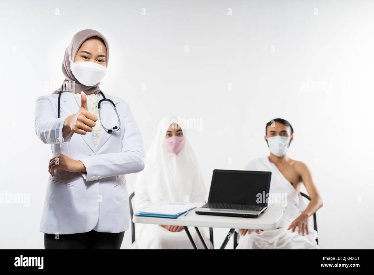 Thumbs up muslim female doctor hi-res stock photography and images - Alamy