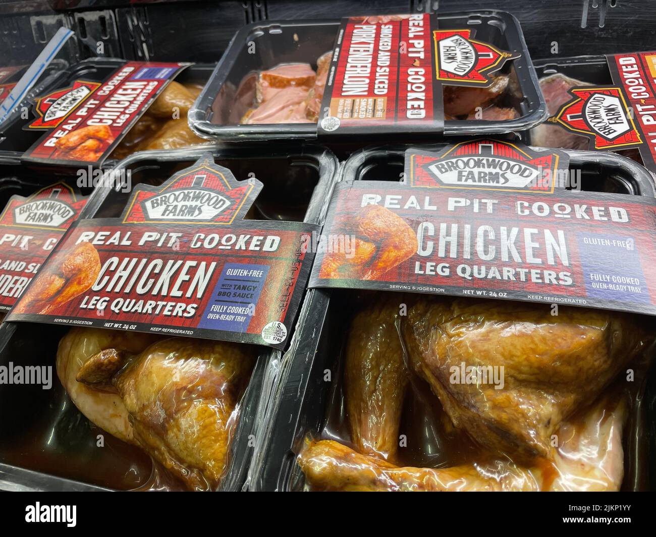 A retail grocery store shelf with Brookwood Farms chicken Stock Photo