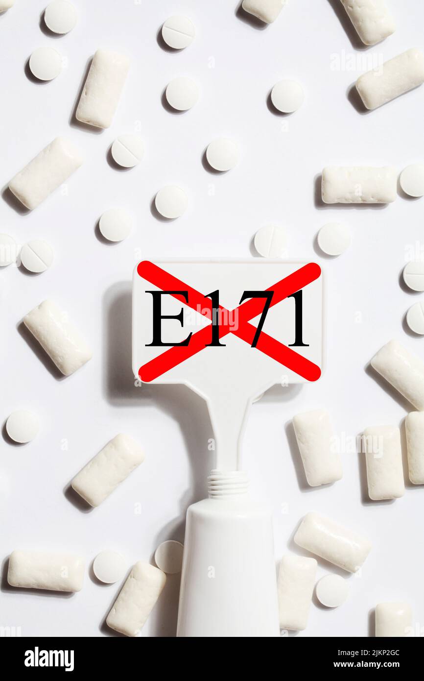 Titanium dioxide, E171, dangerous additive concept. gum, pills