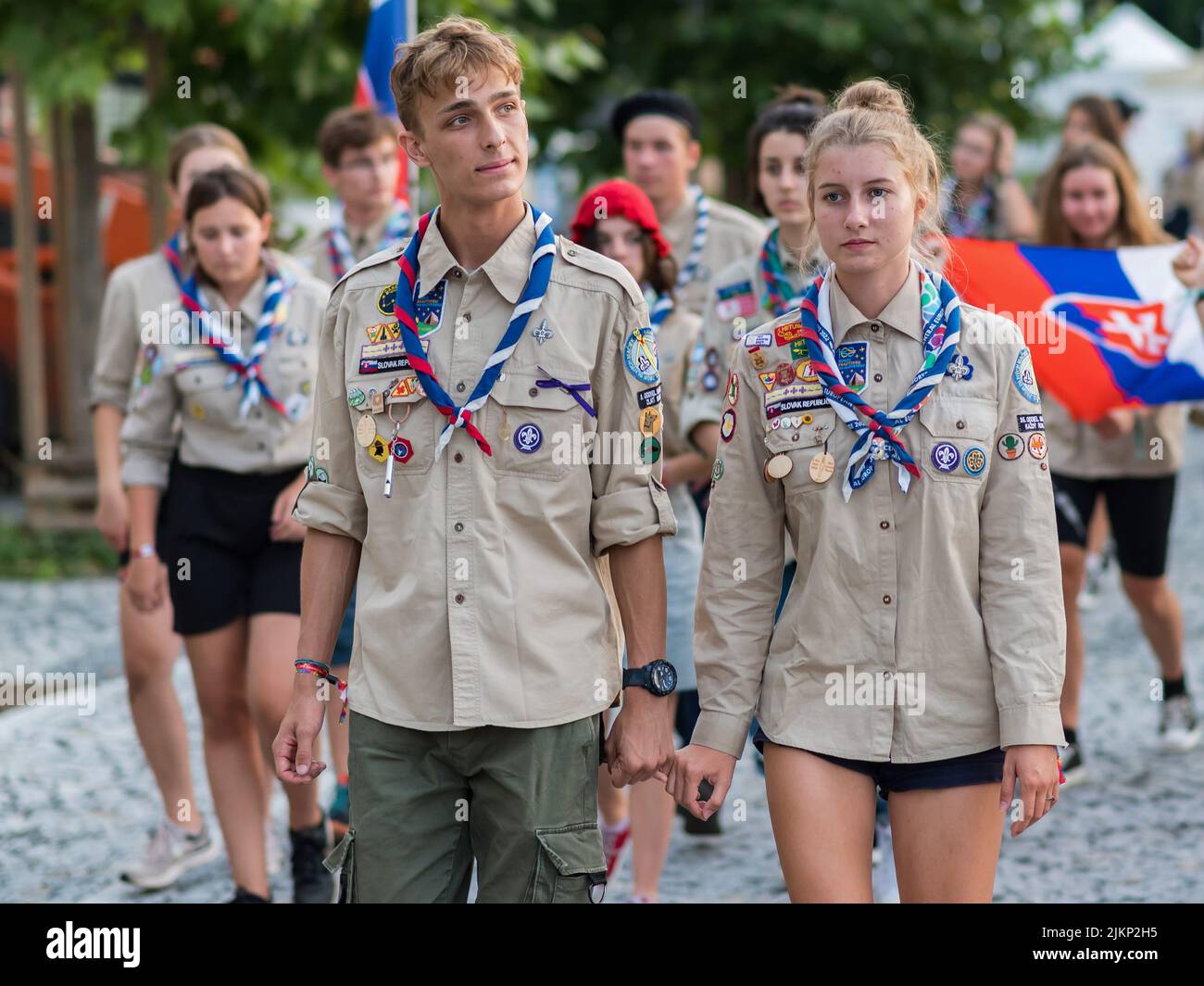 Scouts wearing uniforms are seen walking during the opening ceremony of