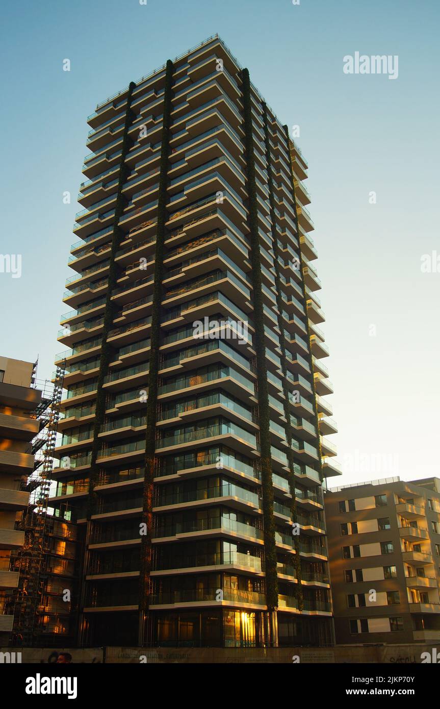 The just completed "EDEN" tower against the evening light. The greening of the facade has been