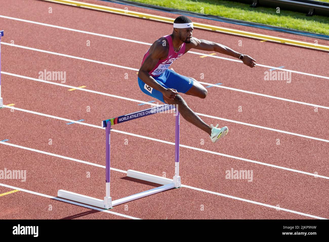 Rai Benjamin (USA) clears a hurdle on the backstretch of the 400 meter
