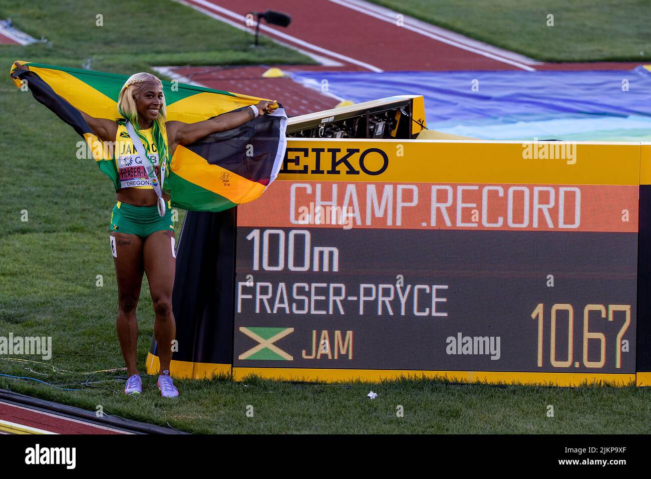 ShellyAnn FraserPryce (JAM) celebrates a world championship in the 100 meters with a