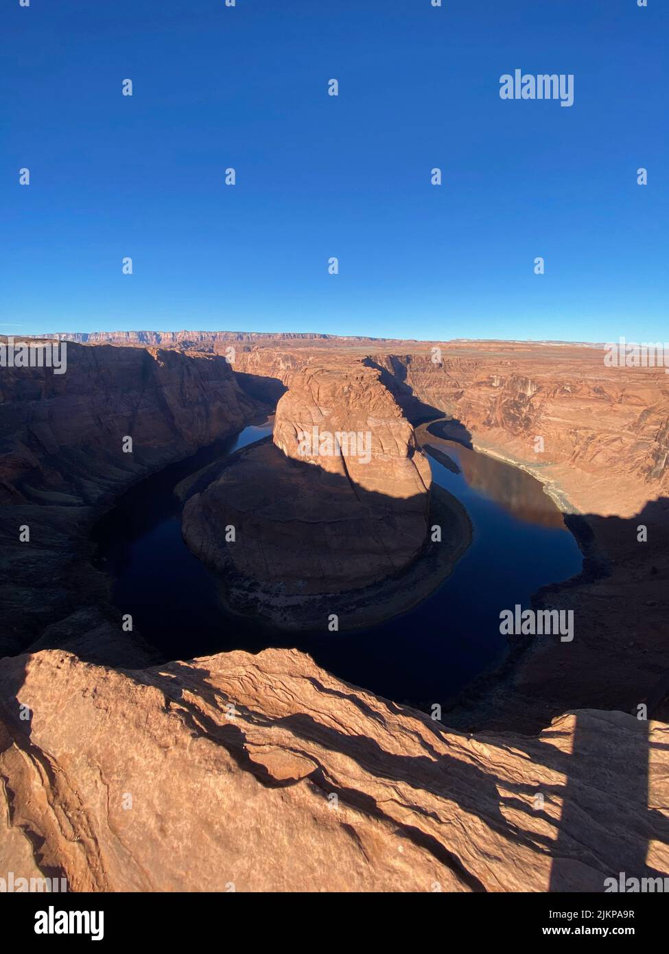 A vertical shot of Horseshoe Bend of the Colorado River in Arizona, USA Stock Photo