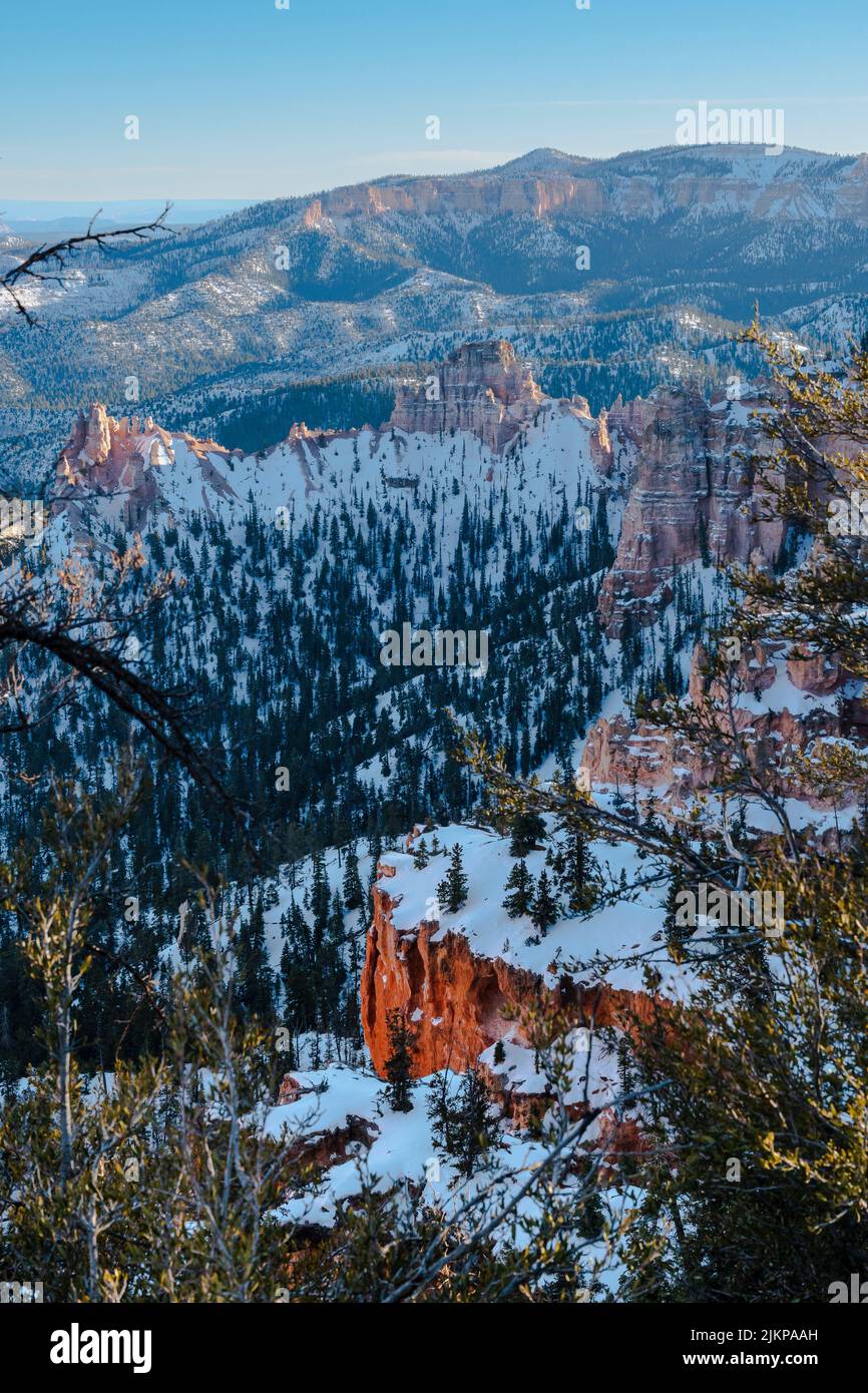 A vertical shot of an alpine mountain landscape in winter Stock Photo