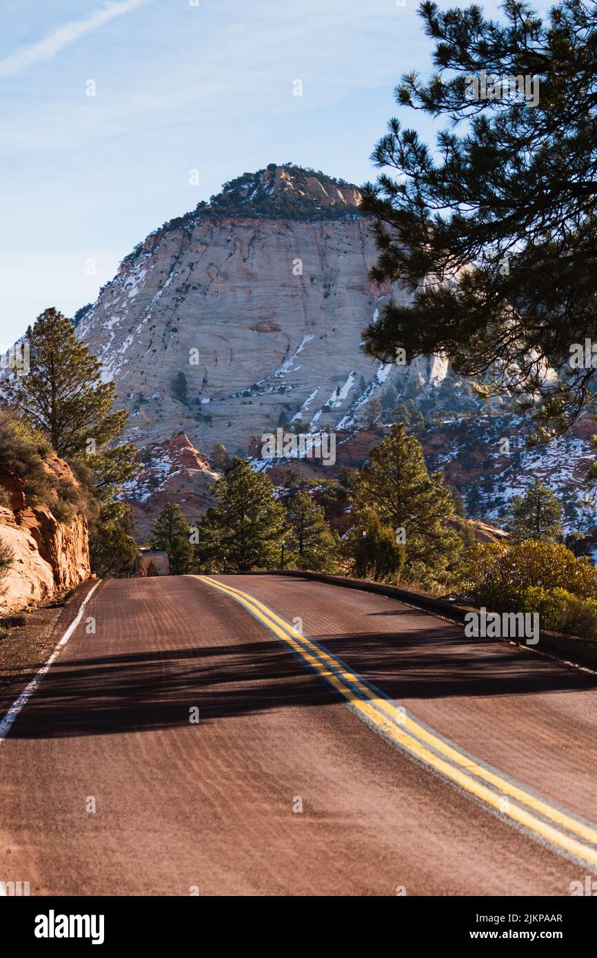 Asphalt road rocky mountains hi-res stock photography and images - Alamy