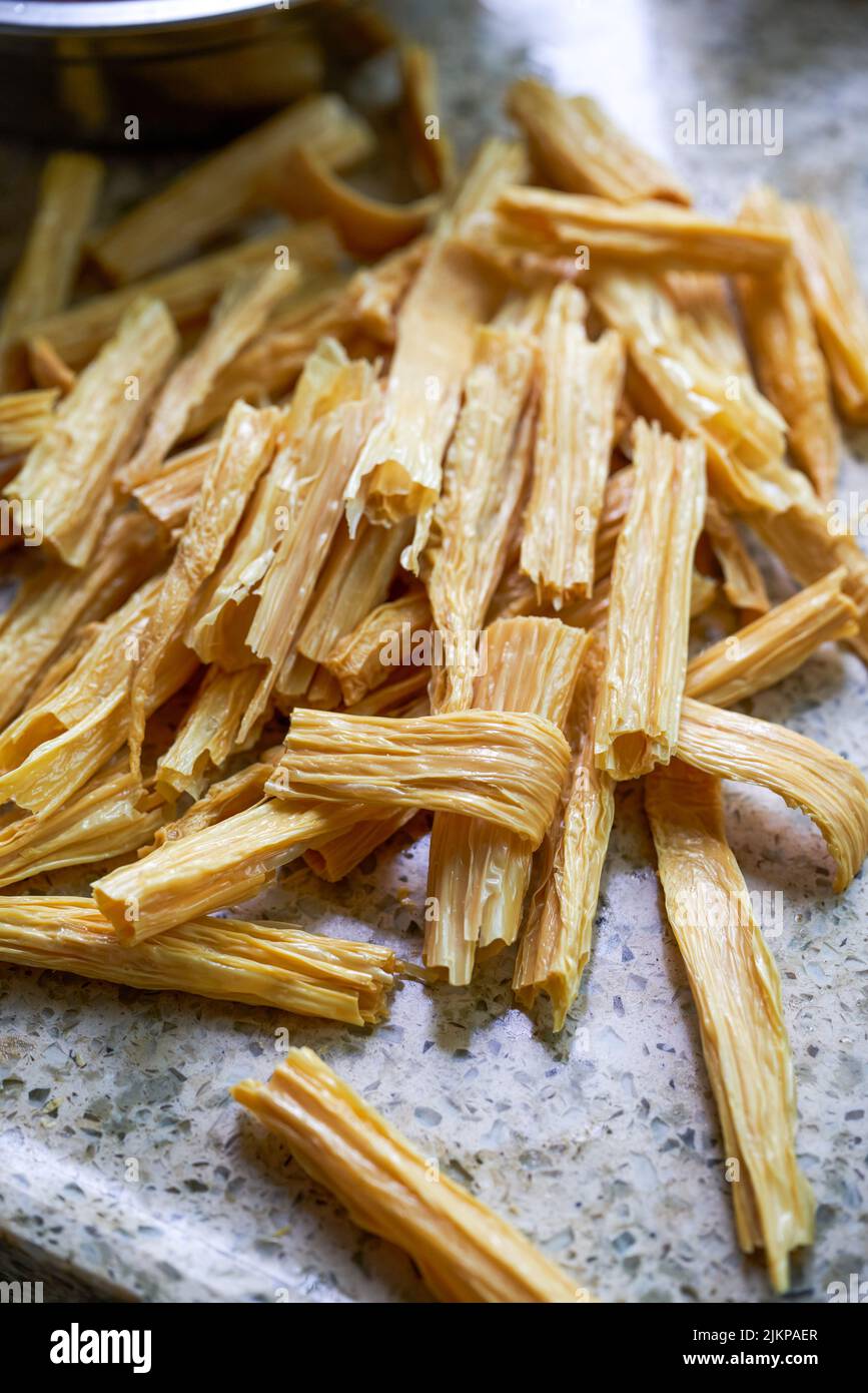 A pile of fresh yuba in the kitchen close-up Stock Photo - Alamy