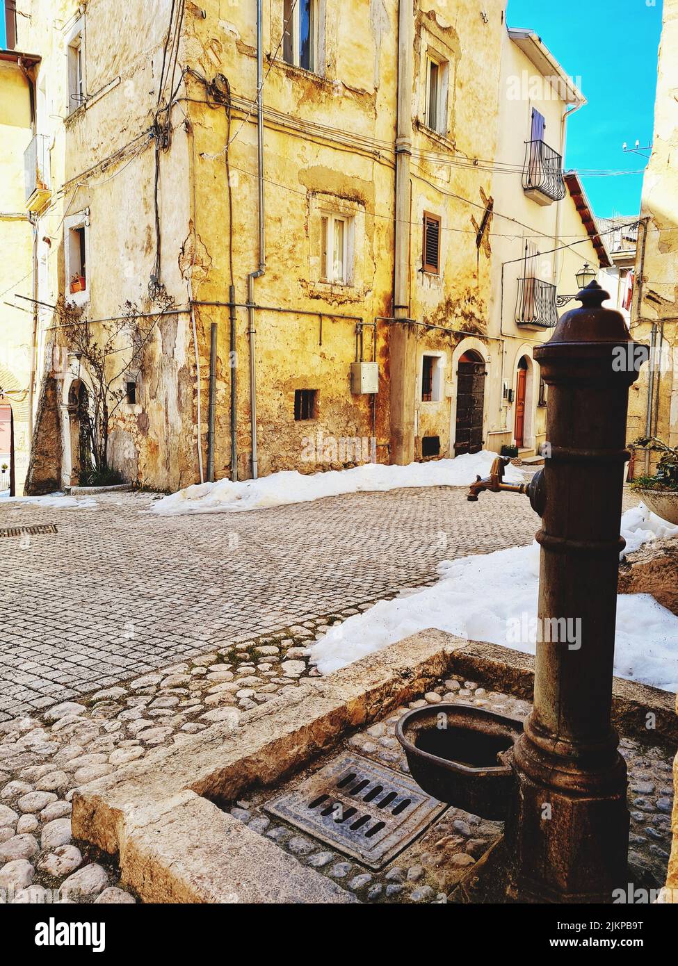 A vertical shot of an old fountain in the historic town of Pescina, L'Aquila, Abruzzo, central Italy Stock Photo