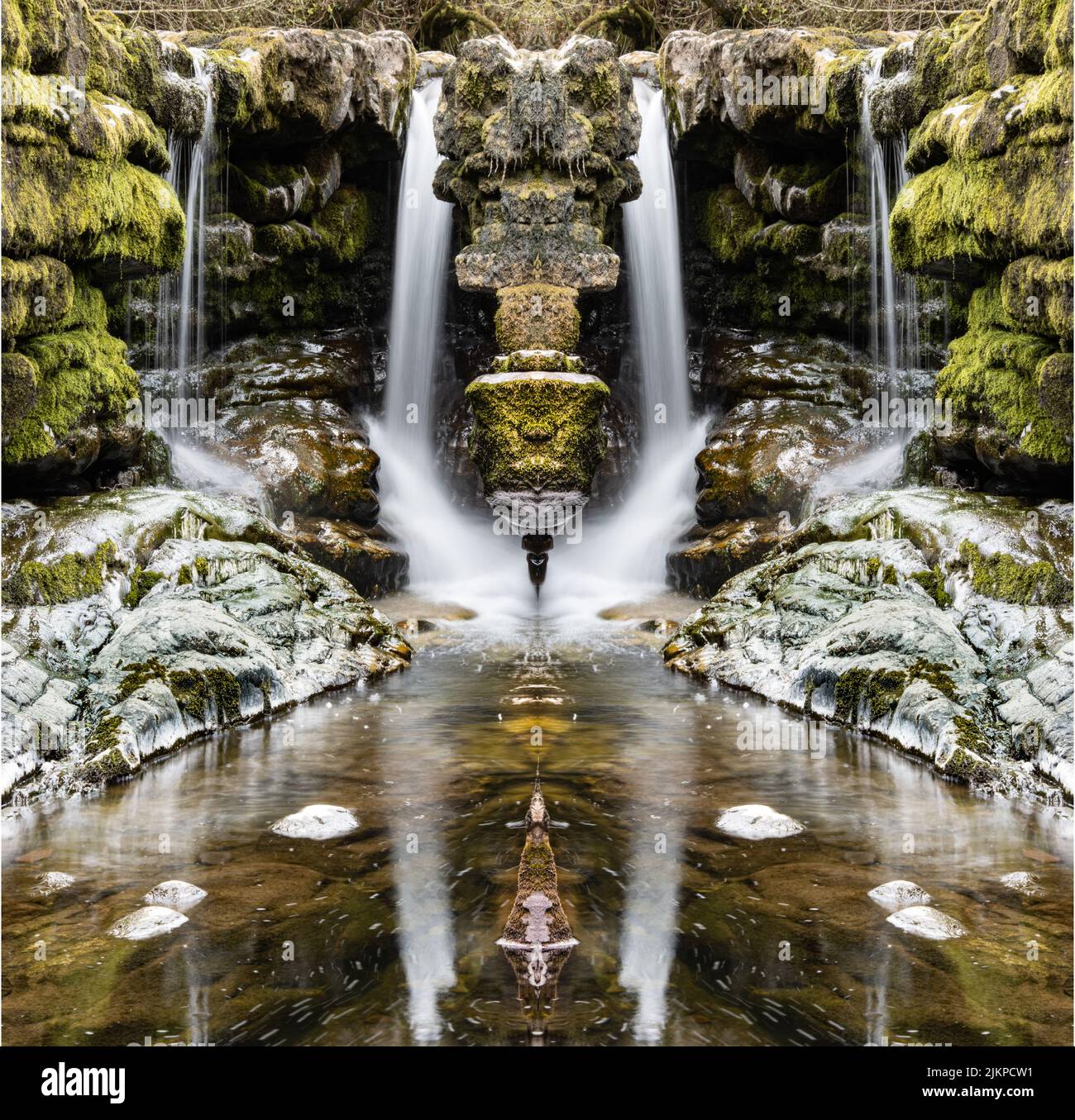 A beautiful shot of a waterfall with a mirror effect. Stock Photo