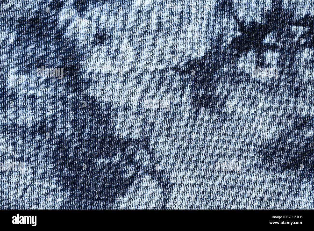 Monochrome deep blue tie-dye pattern, abstract fabric background photo texture Stock Photo