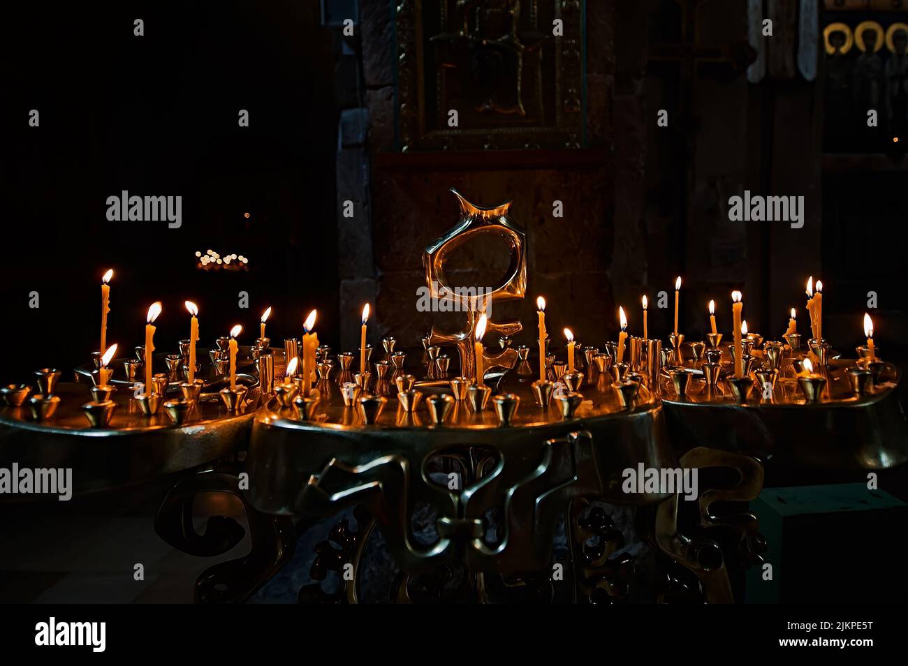 Wide candlestick with burning candles Stock Photo