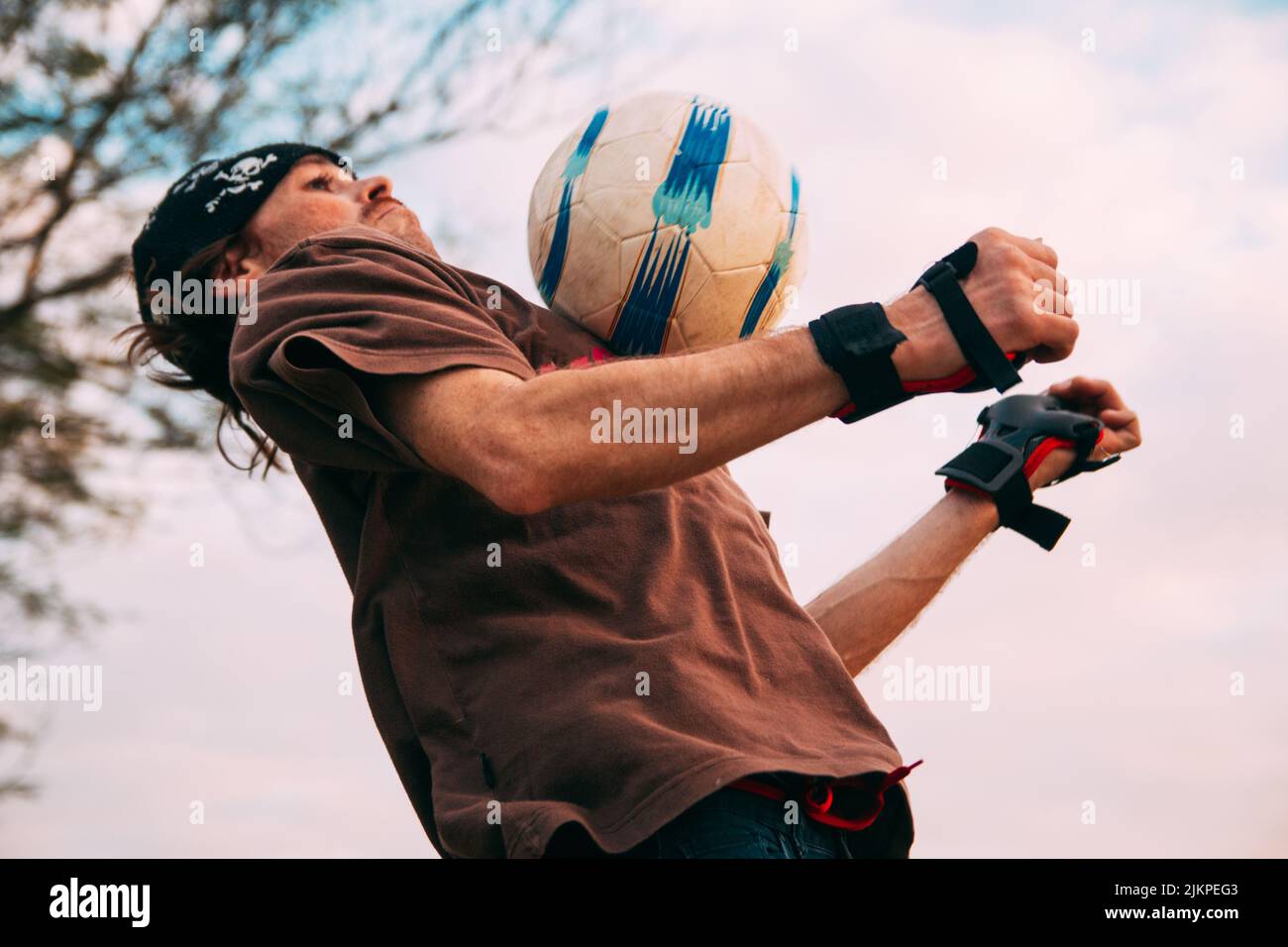 A closeup of a man playing soccer Stock Photo