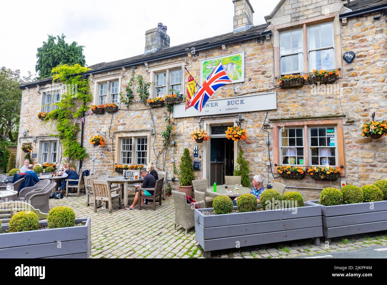 Waddington Village in the Ribble valley of Lancashire and The Lower Buck Inn public house,England,Uk, pub exterior with Union Jack flying, summer 2022 Stock Photo