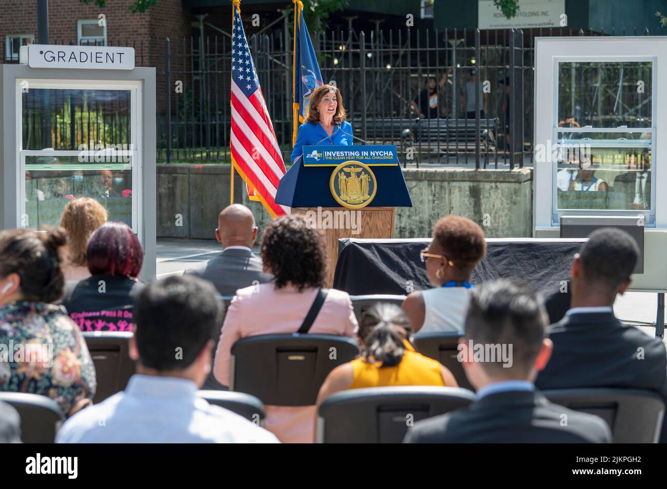 Governor Kathy Hochul speaks during a joint housing and clean energy-related announcement at Woodside Houses NYCHA complex in Queens Borough of New York City. Governor Hochul and Mayor Adams announce $70 million initial investment to decarbonize NYCHA buildings as part of clean heat for all challenge. The plan calls for the installation of what's called an 'electric heat pump', developed by NYPA selected Midea America and Gradient, in 30,000 units, which would provide tenants in each apartment with the ability to control the heat or keep their units cool throughout the year. (Photo by Ron Adar Stock Photo
