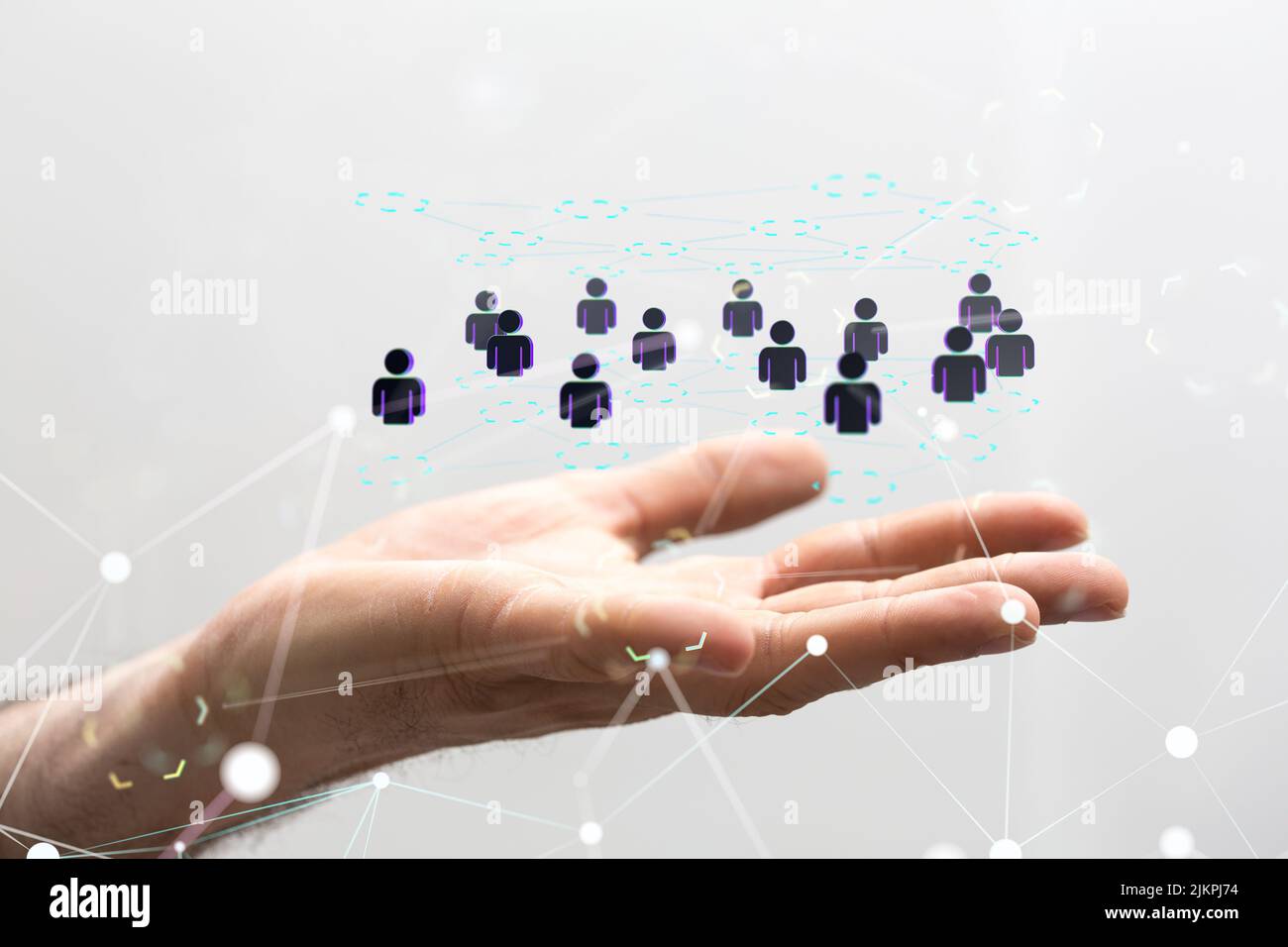 A 3D rendering of a group of floating people icons on a businessman's ...