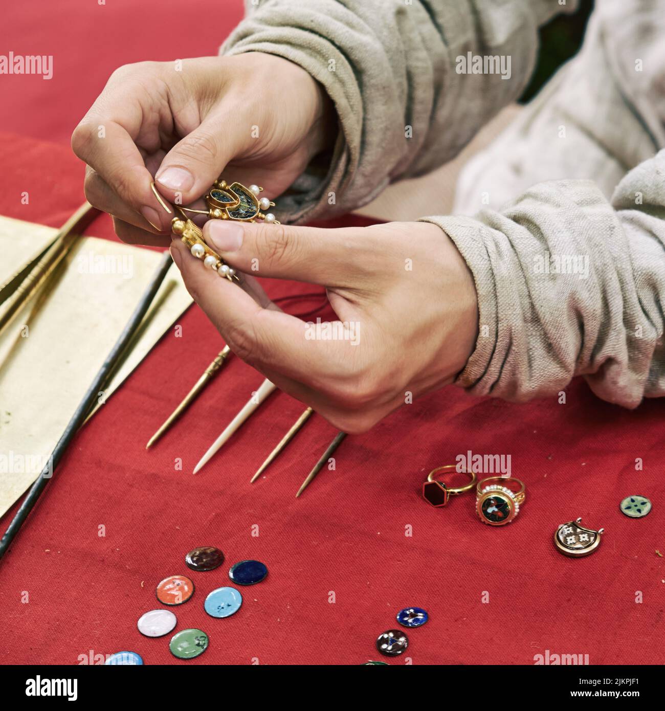 Making medieval jewelry vintage earrings and rings. Reconstruction of