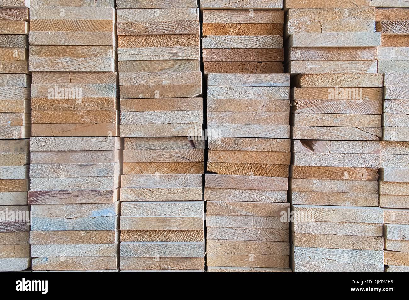 Stacked heads wood rectangle shape on warehouse store, wood texture and background Stock Photo