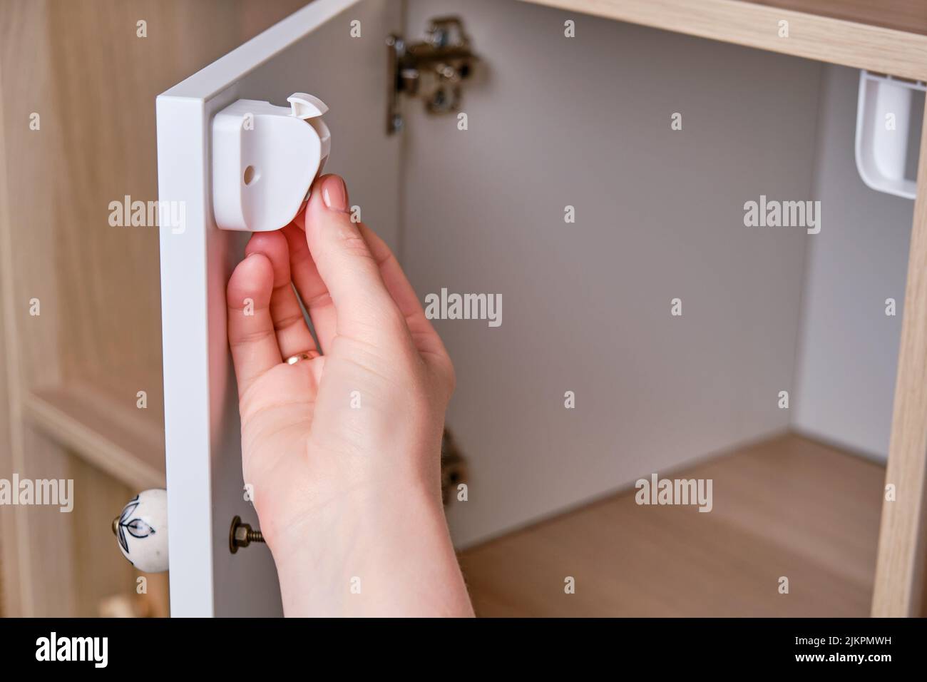 Installing a childproof lock to protect doors and