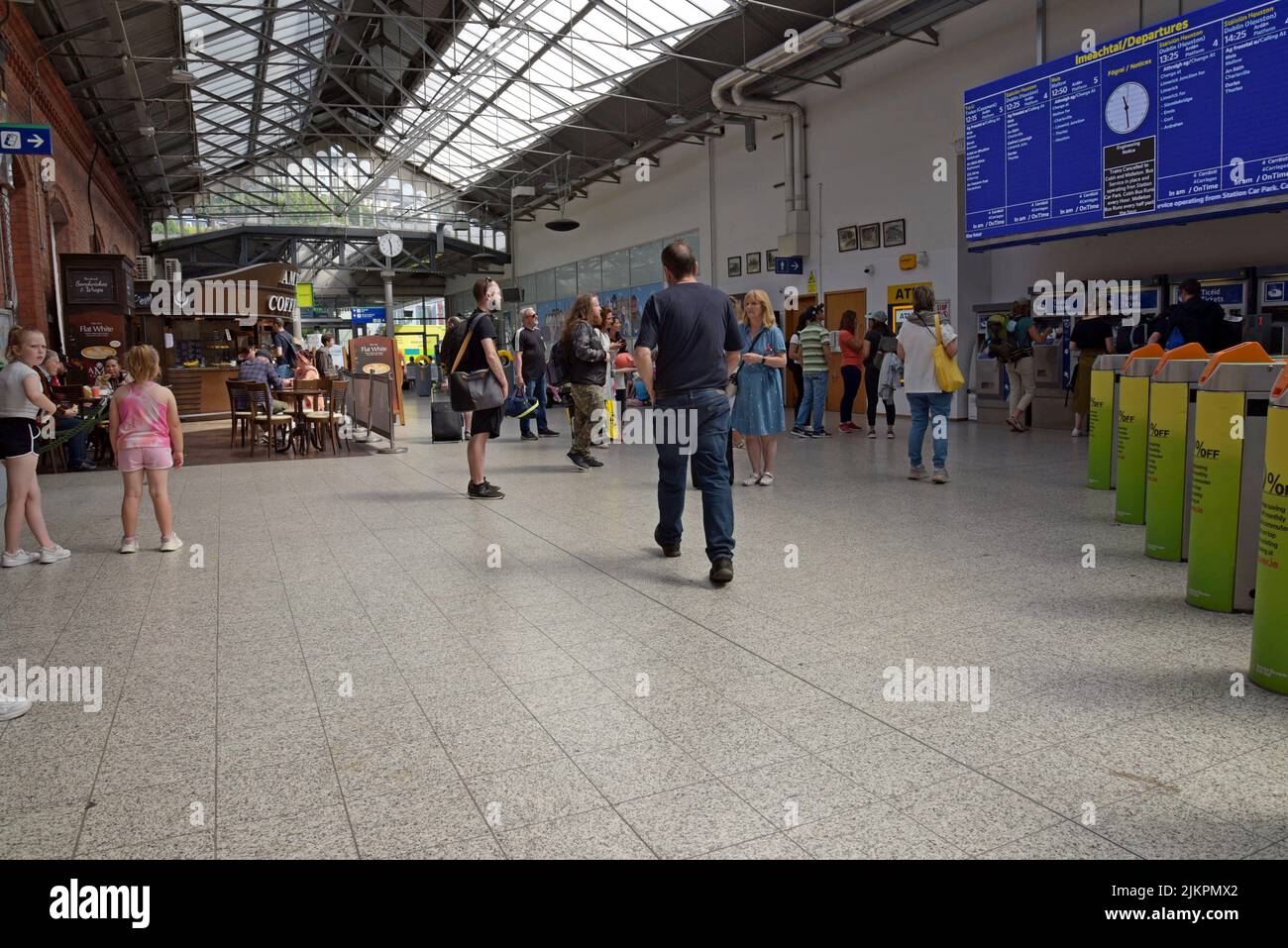 Passengers on the concourse of Cork Kent railway Station, Cork, Ireland. July 2022 Stock Photo