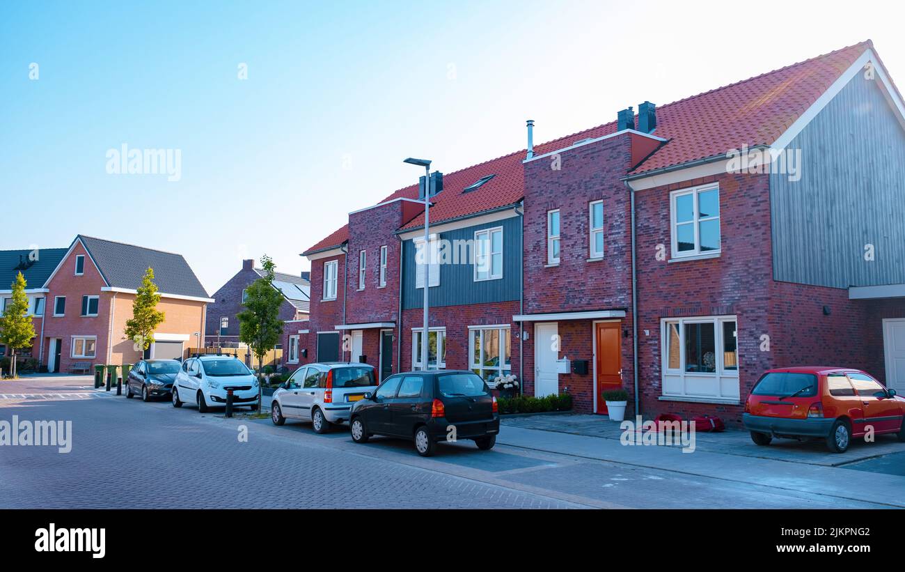 Dutch Suburban area with modern family houses, newly build modern family homes in the