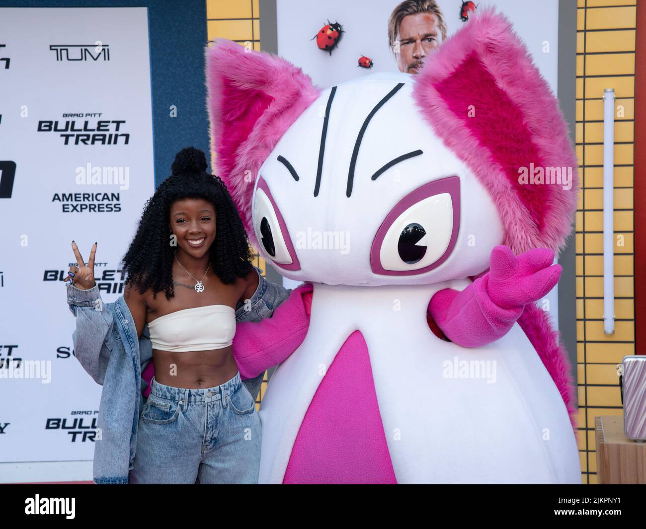 August 1, 2022, Westwood, California, USA: Thuso Mbedu and The mysterious mascot named Momomon attends the Los Angeles Premiere Of Columbia Pictures' ''Bullet Train' (Credit Image: © Billy Bennight/ZUMA Press Wire) Stock Photo