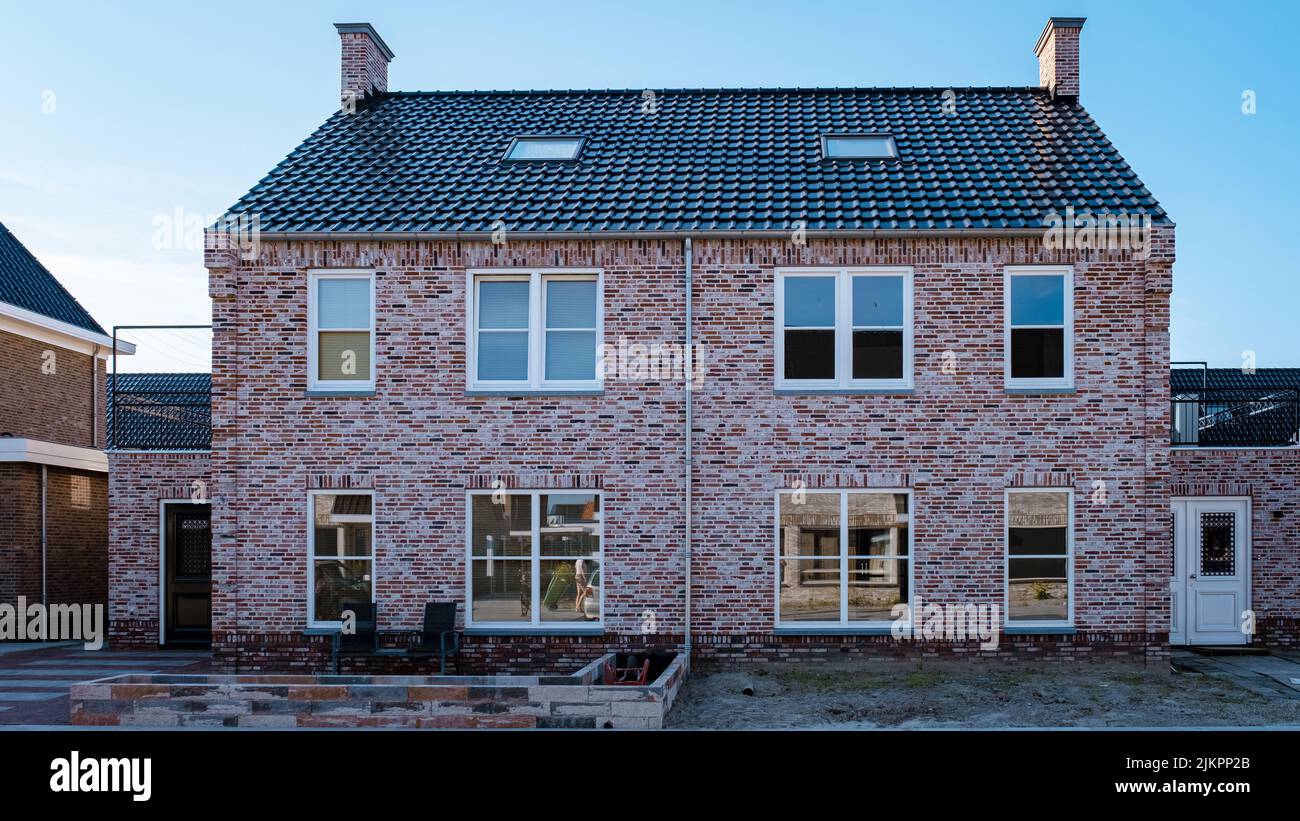 Dutch Suburban area with modern family houses, newly build modern family homes in the