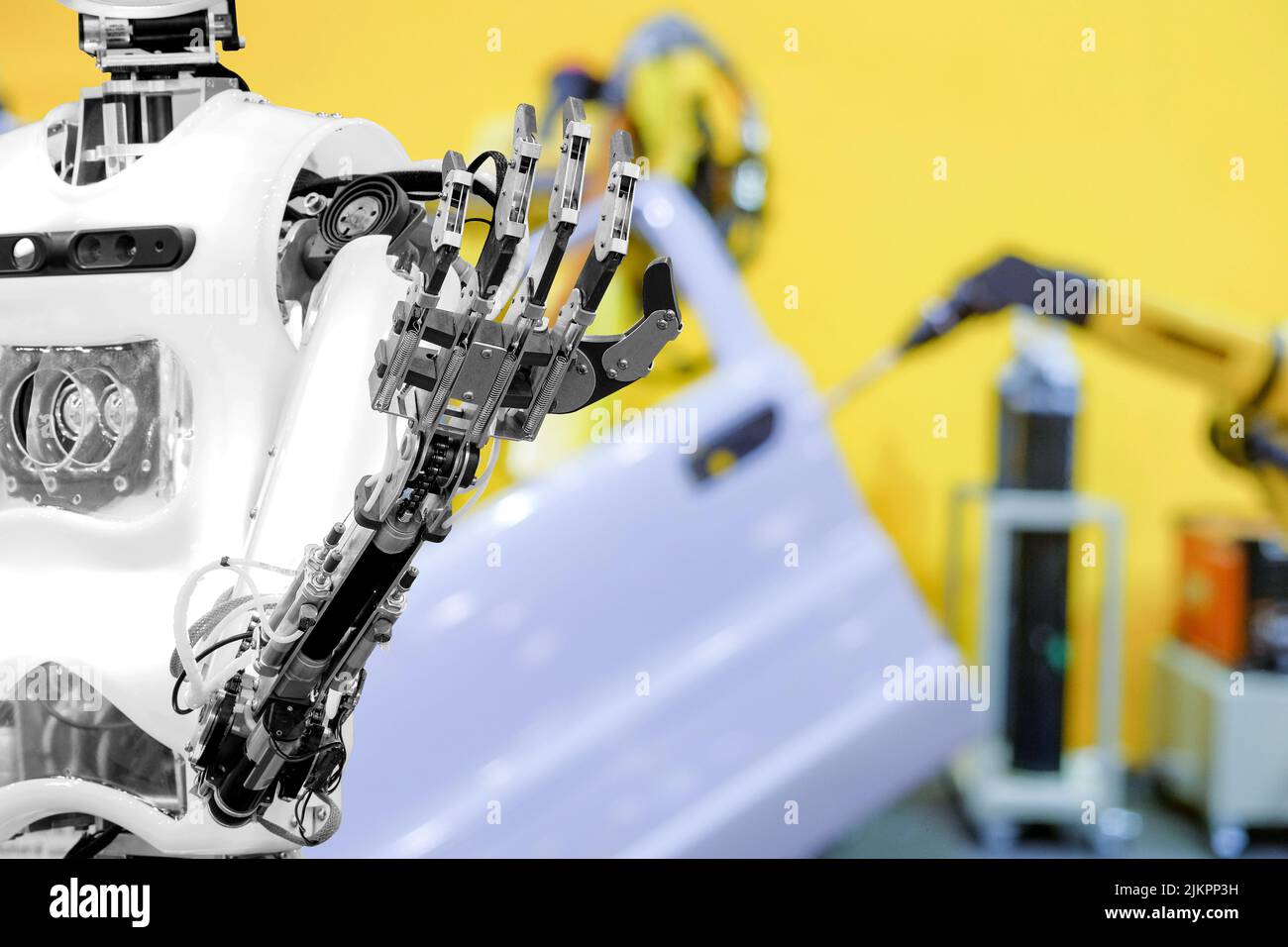 Artificial Intelligence (AI) on blurred industrial robotics working with auto part background, automation work instead on human concept, industry 4.0 Stock Photo