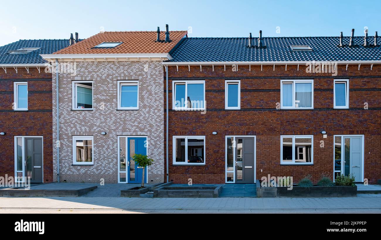 Dutch Suburban area with modern family houses, newly build modern family homes in the