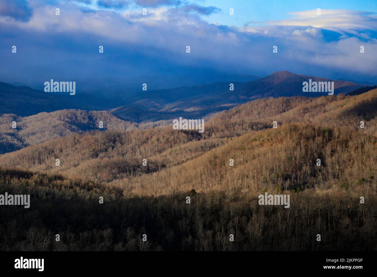 The beautiful view of the hills against the blue sky. Stock Photo