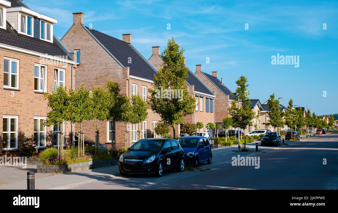 Dutch Suburban area with modern family houses, newly build modern family homes in the
