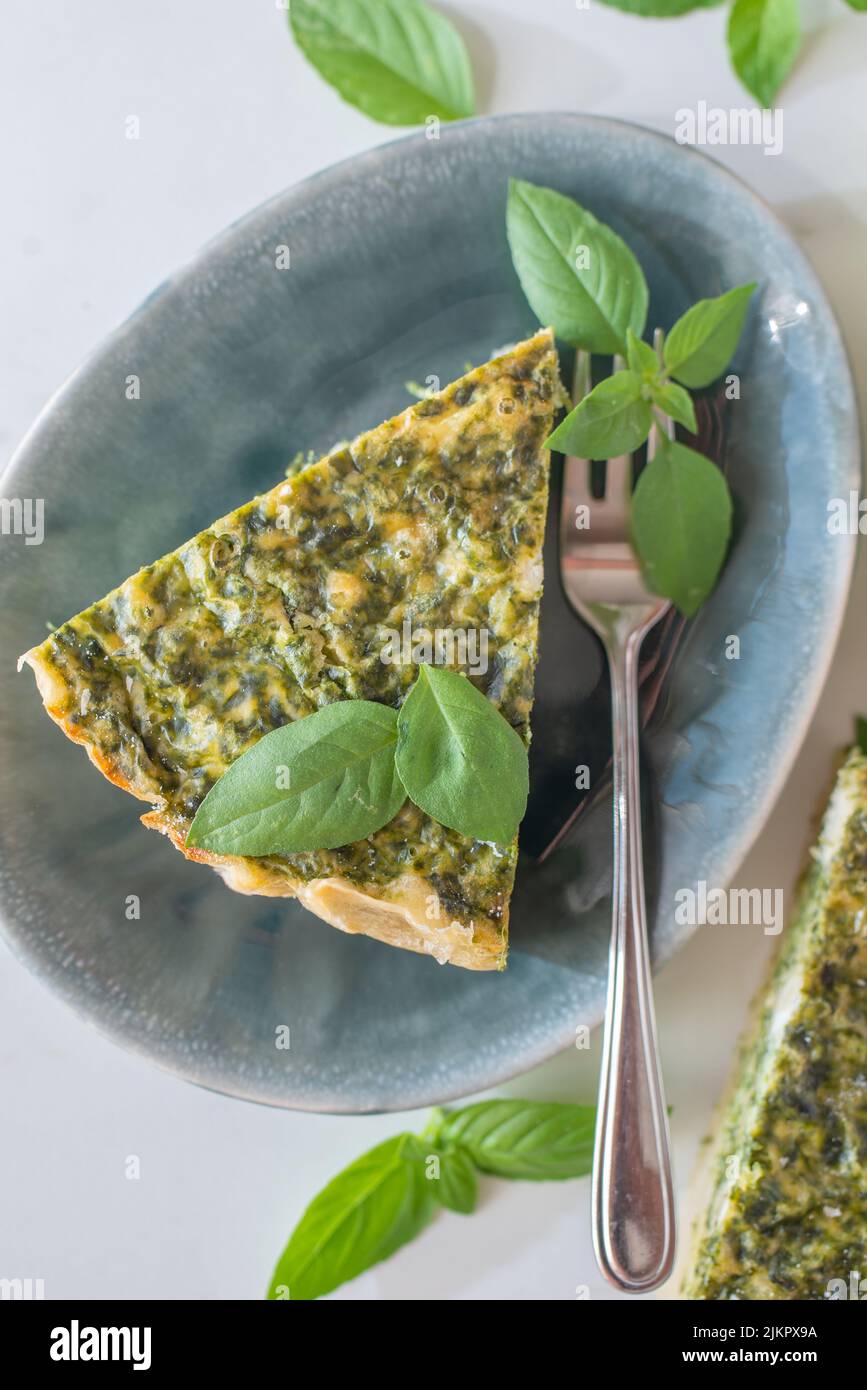 Quiche with spinach traditional dish of french cuisine Stock Photo