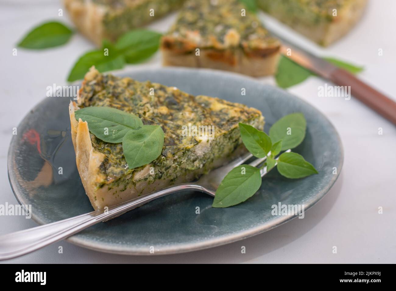 Quiche with spinach traditional dish of french cuisine Stock Photo