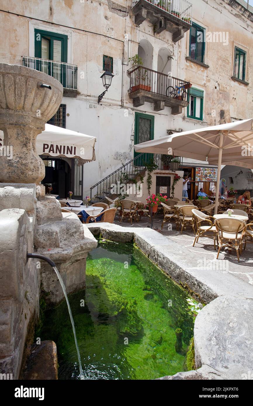 Well and restaurant at the Piazza, village Atrani, neighbor village of Amalfi, Amalfi coast, Unesco World Heritage site, Campania, Italy, Europe Stock Photo