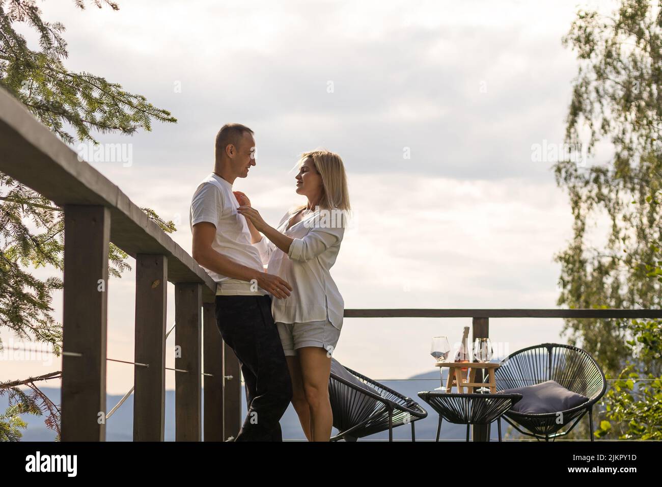 beautiful young couple enjoying nature at mountain Stock Photo Alamy
