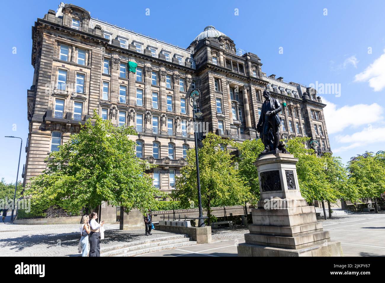 Glasgow Royal Infirmary hospital with view of cathedral square and David Livingstone statue, Glasgow city centre,Scotland,Uk summer 2022 Stock Photo