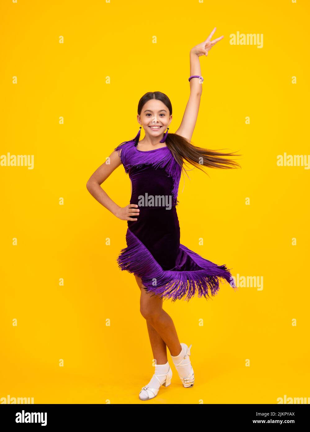 Teenager child girl dancing ballroom dance. Choreography class, dance