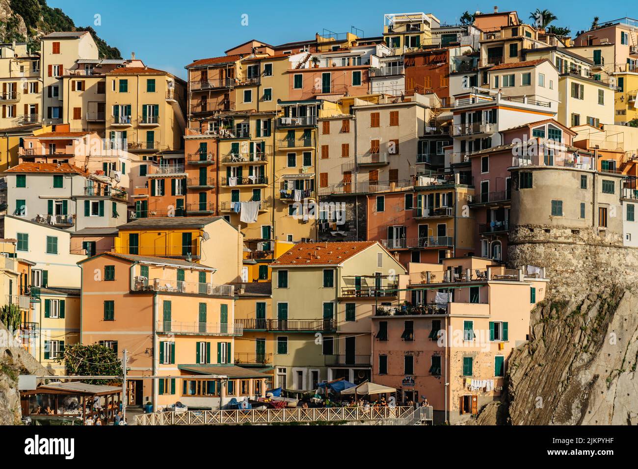 View of Manarola,Cinque Terre,Italy.UNESCO Heritage Site.Picturesque colorful village on rock above sea.Summer holiday,travel background.Italian Stock Photo